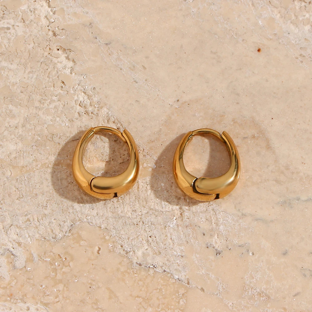 Belle Duo Earrings in gold flatlay