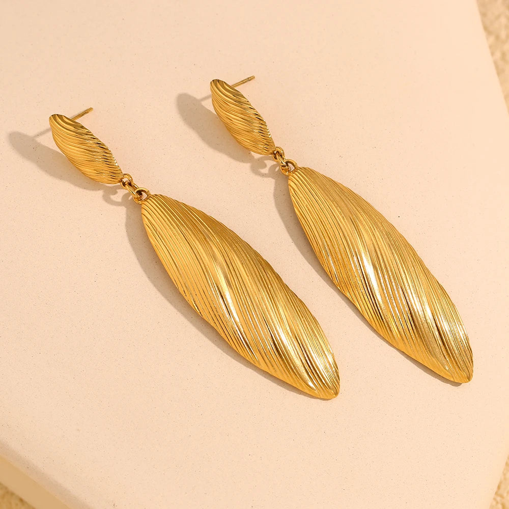 Goddess Lore Earrings Gold flat lay