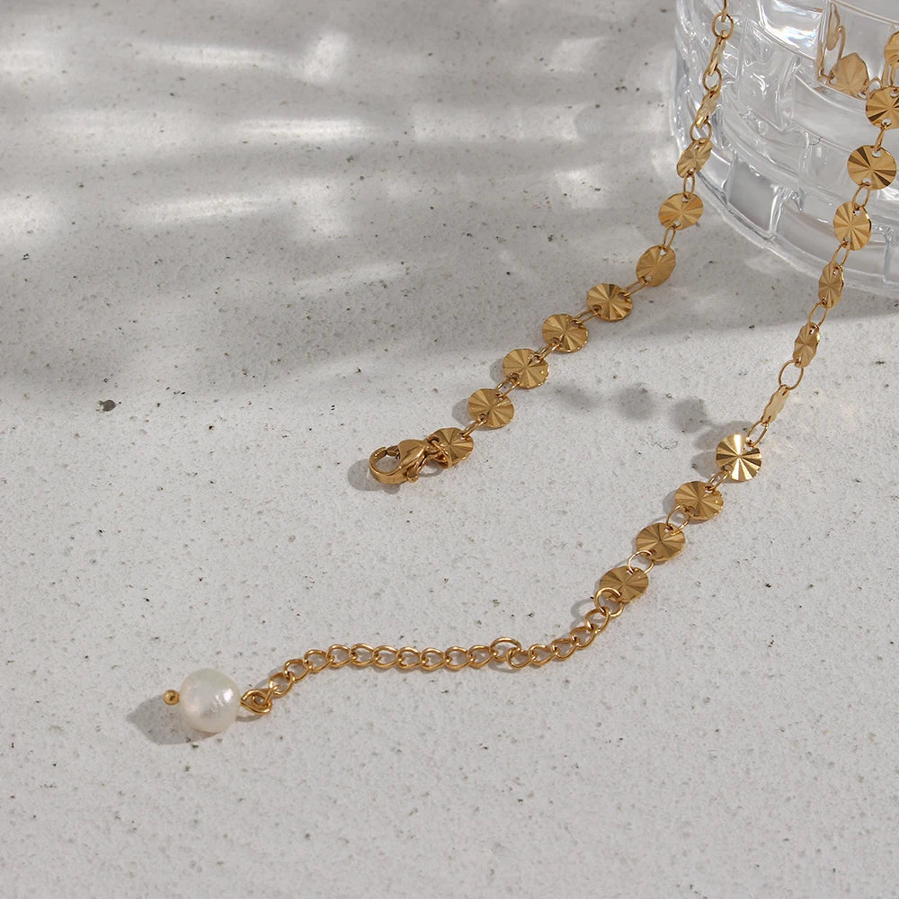 Holy Shimmers Necklace on glass