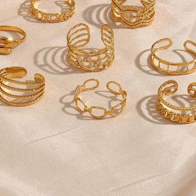 An adjustable gold ring with a minimalist linked design