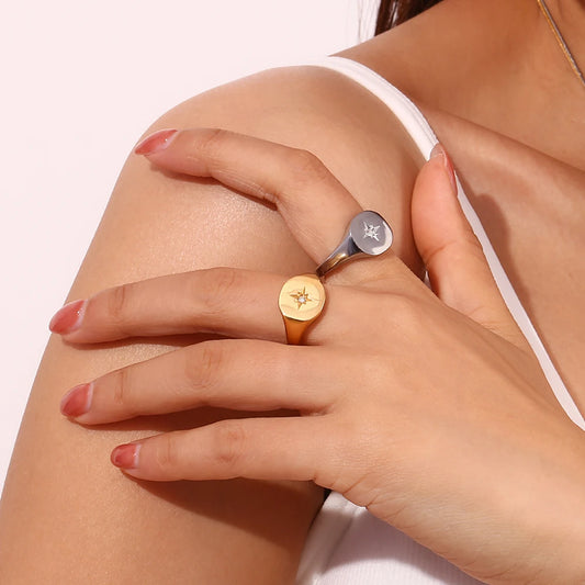 North Star Signet Rings on fingers