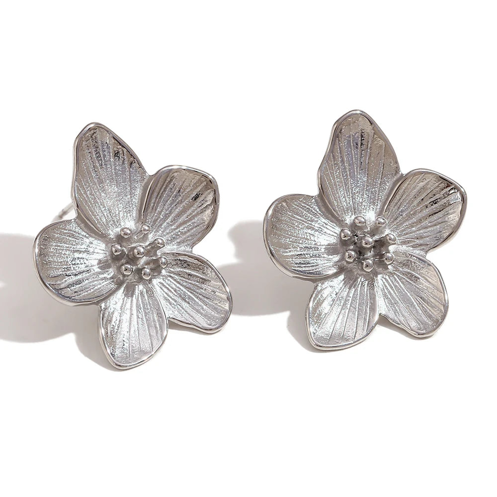 Sakura Grace Stud Earrings in silver on white background