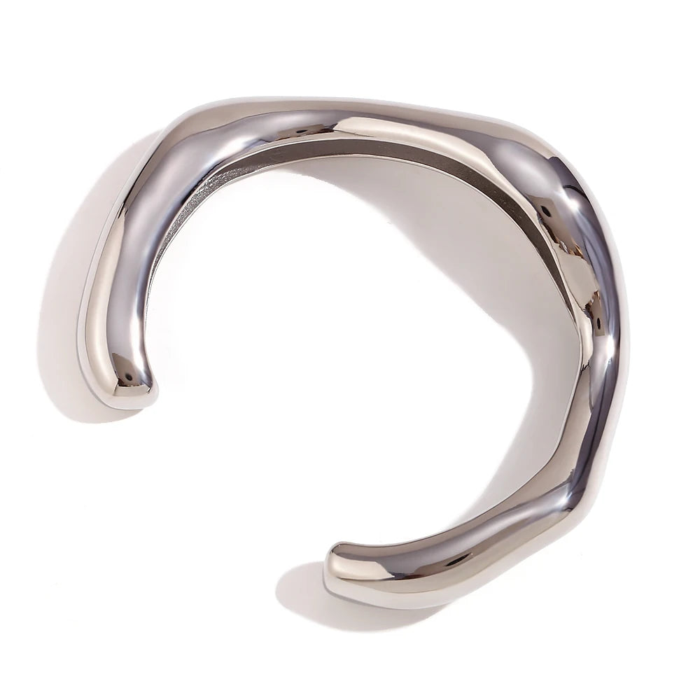 Sculpted Bangle Bracelet in silver flatlayed