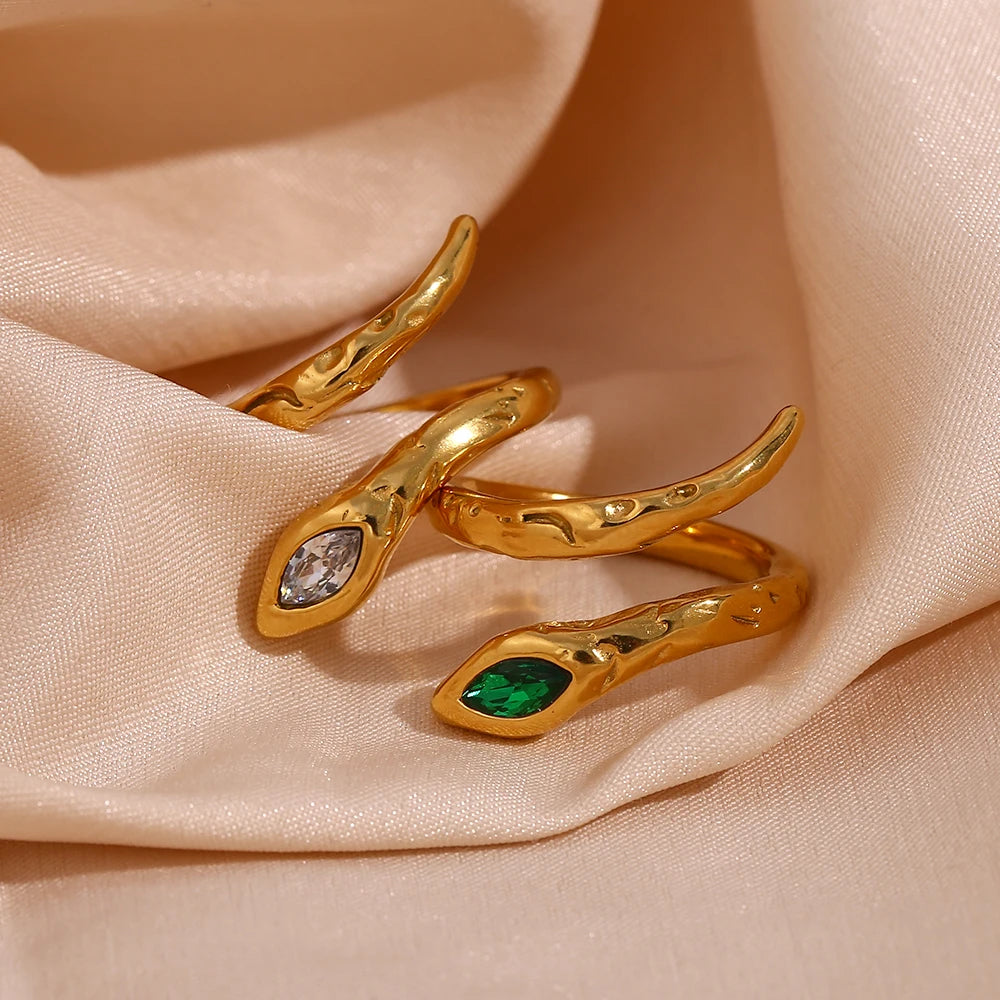 An 18K gold plated stainless steel ring in the shape of a snake with a zirconia crystal on the head