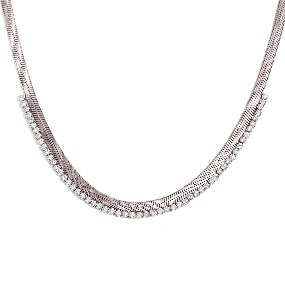 A stainless steel necklace with a chain design and adorned with AAA zirconia in a curved pattern, providing a sparkling appearance.