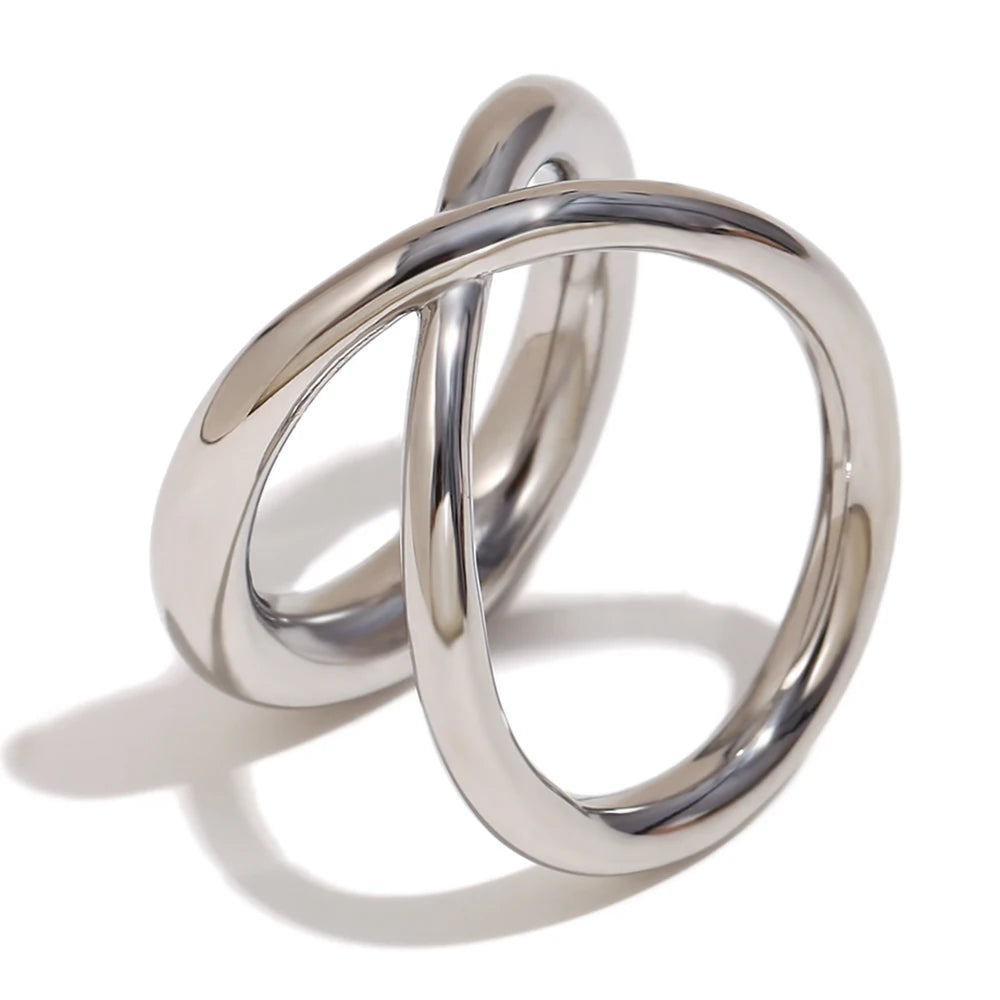 Elegant silver stainless steel, double looped ring with a smooth finish.