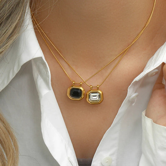 gold-plated stainless steel necklaces with a square-shaped AAA zirconia pendant, displayed on a model's neck