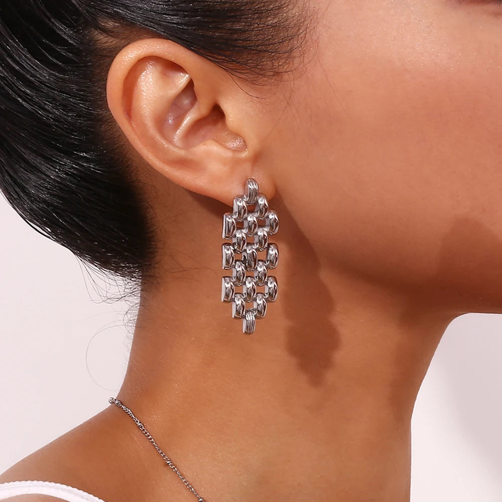 Unity_Earrings_on model in silver