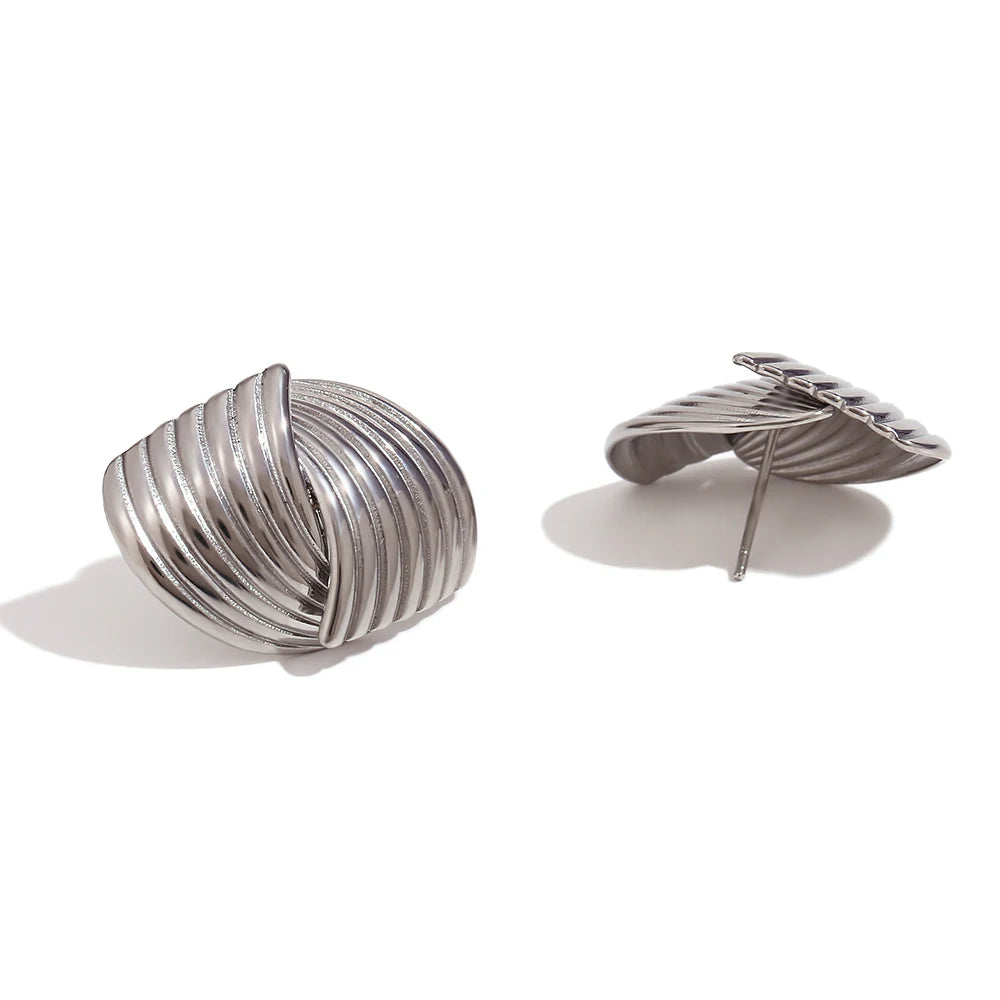 Uptown Girl Earrings in silver on white background