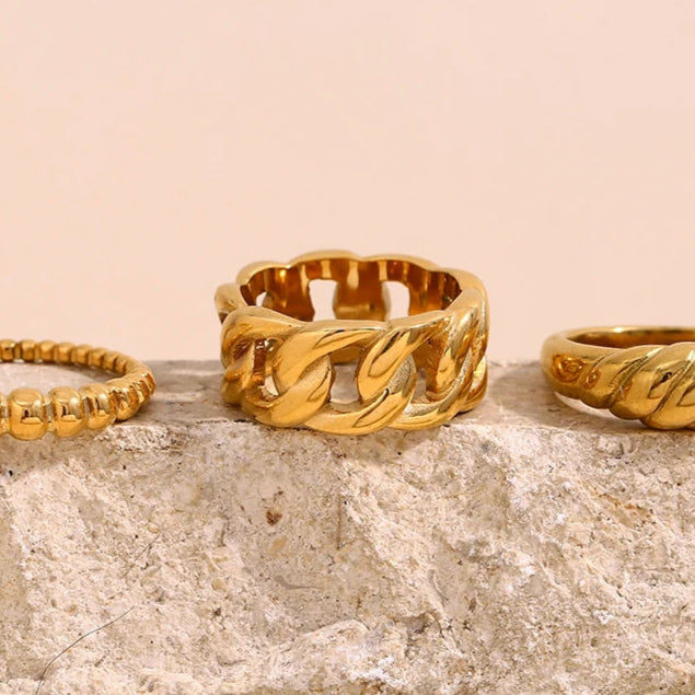 A bold chain ring made of 18K gold plated stainless steel.