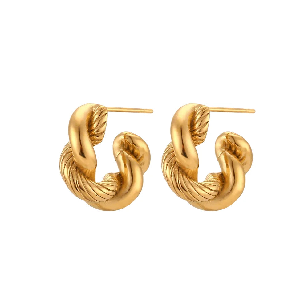 A pair of small, 18K gold plated twisted hoops earrings.