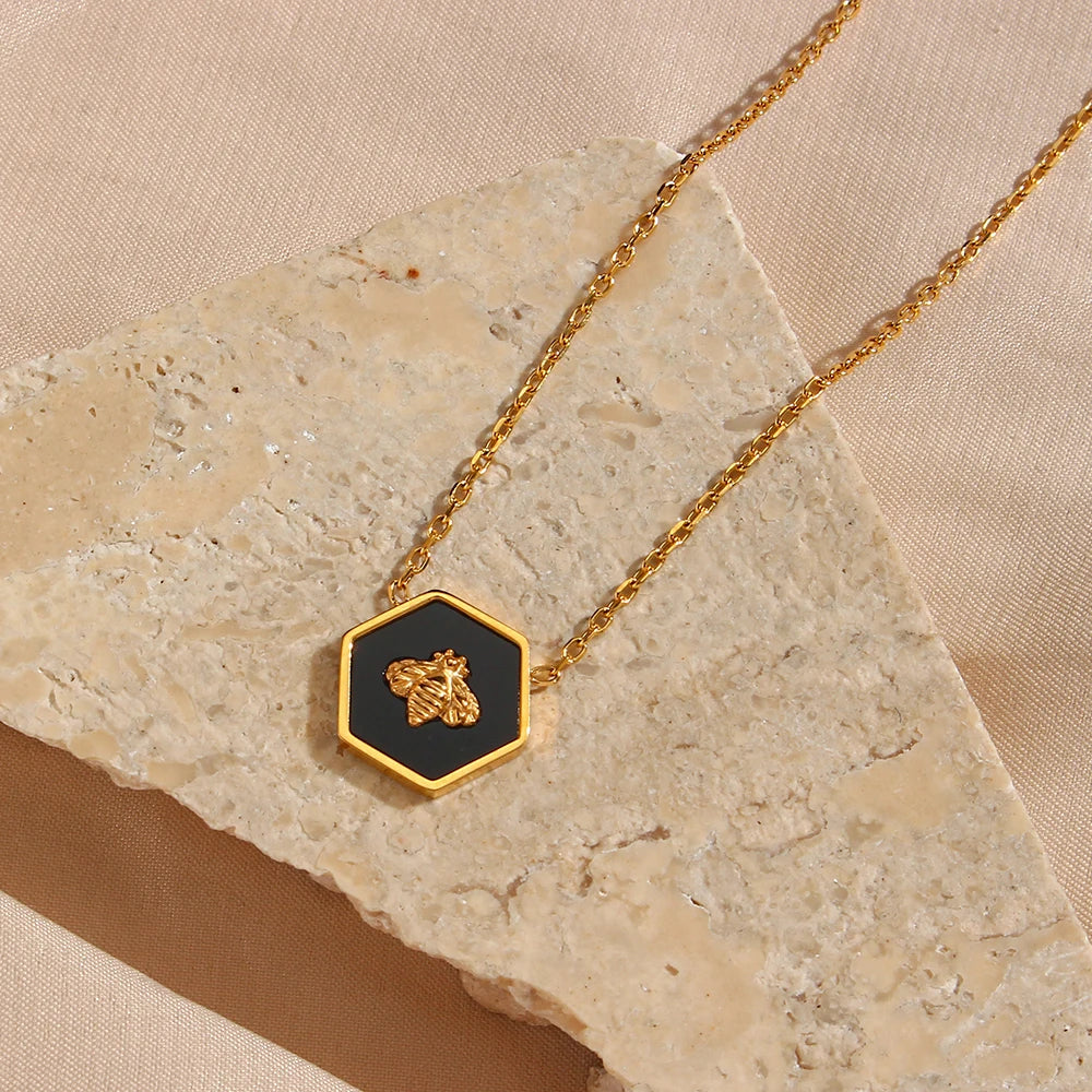 Blessed Bee Necklace in gold with black