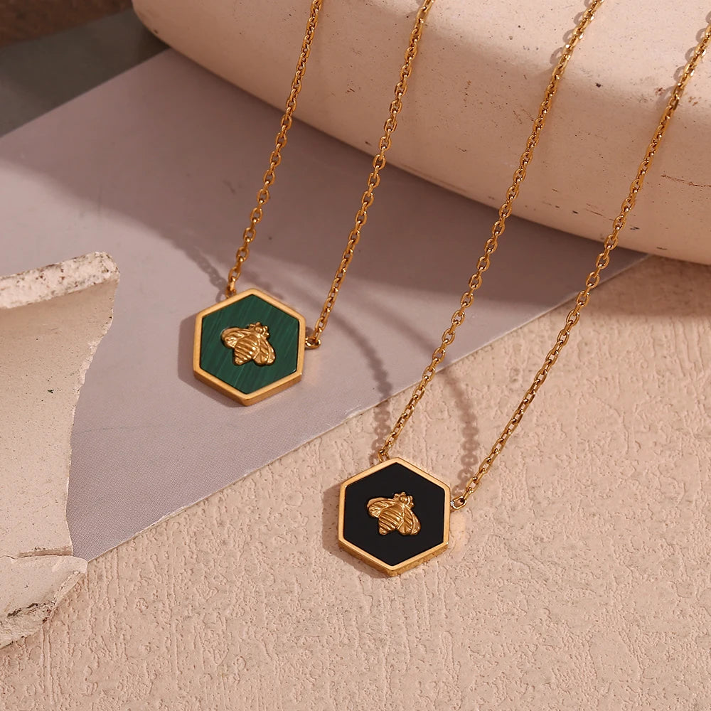 Blessed Bee Necklaces on display