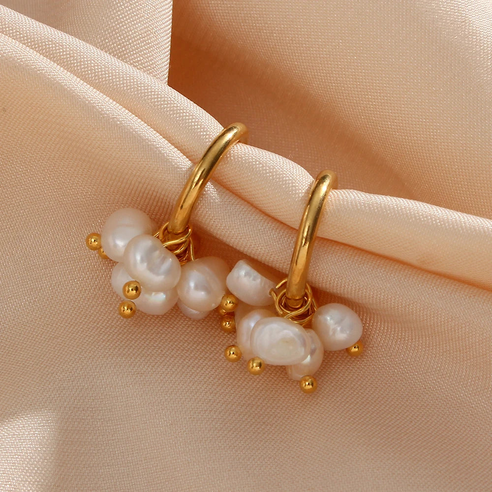 Dewdrops hoop earrings display on fabric
