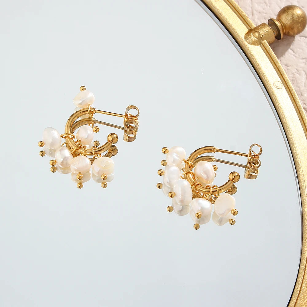 dewdrop hoops earrings flatlay on mirror