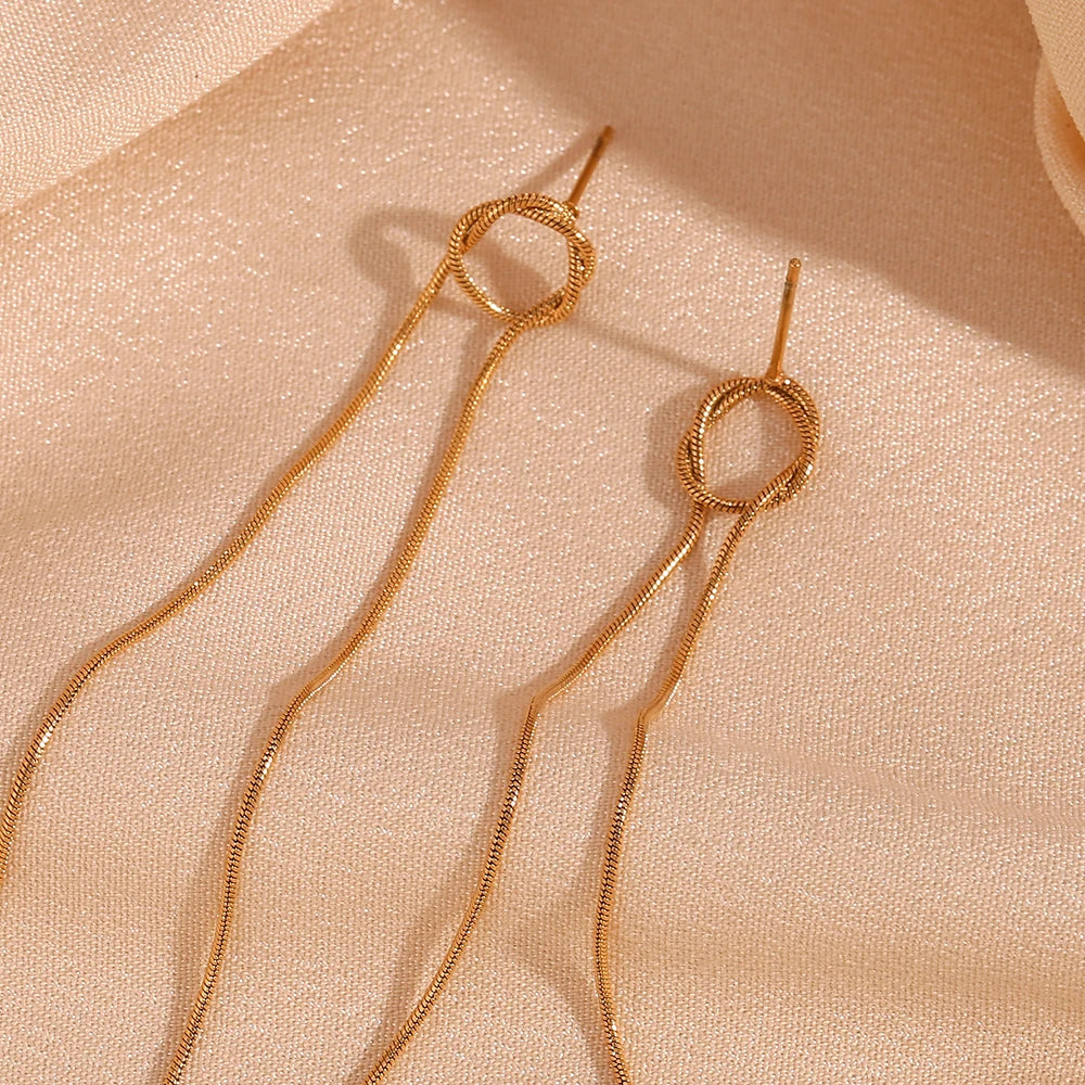 Glowline Earrings flat lay