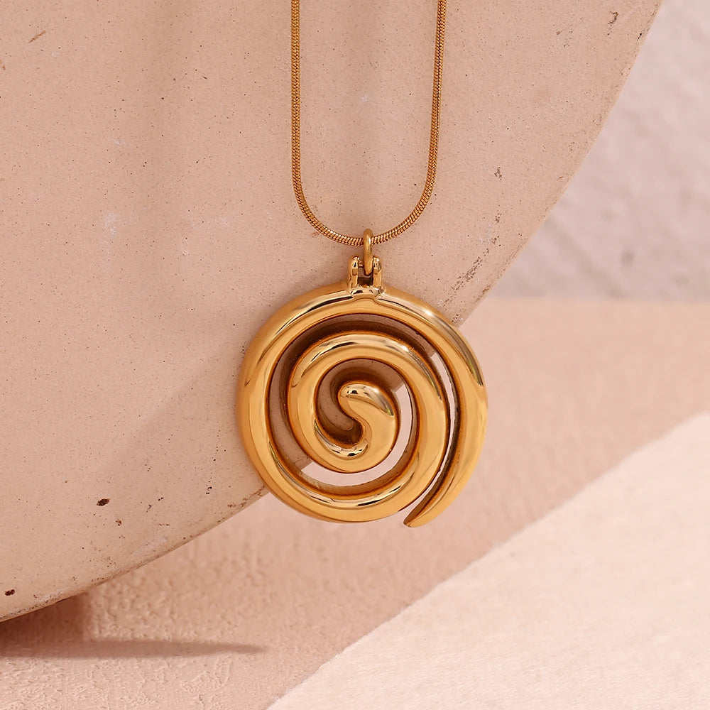 Golden Vortex Necklace on display