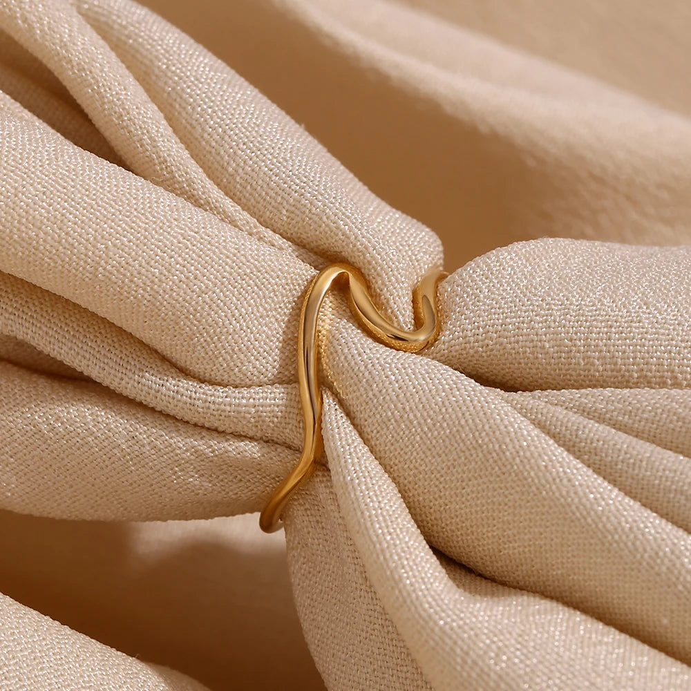 Golden Wave Ring on fabric