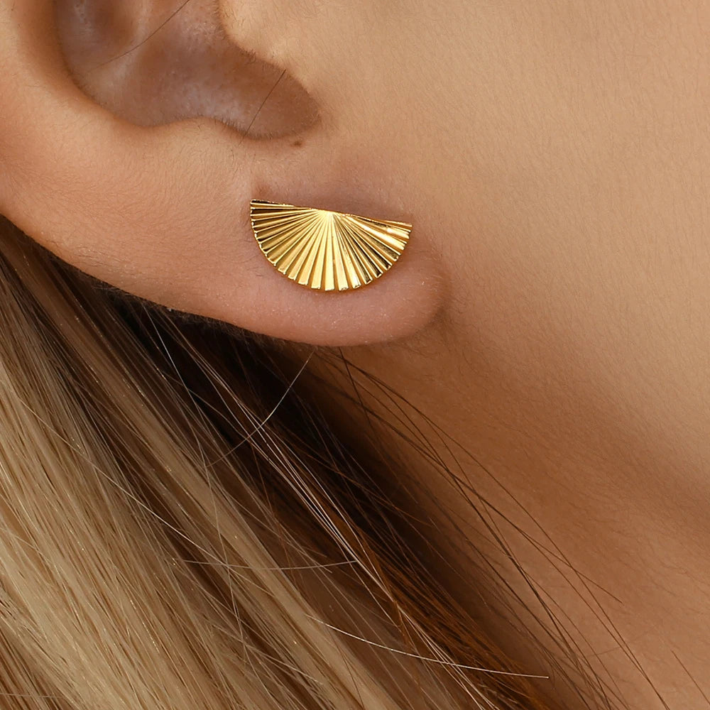 Inner Light Earrings half circle stud on model