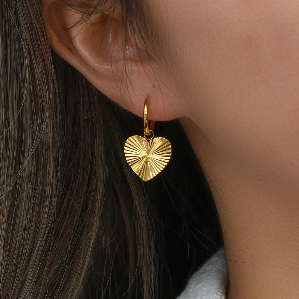 Inner Light Earrings heart on model