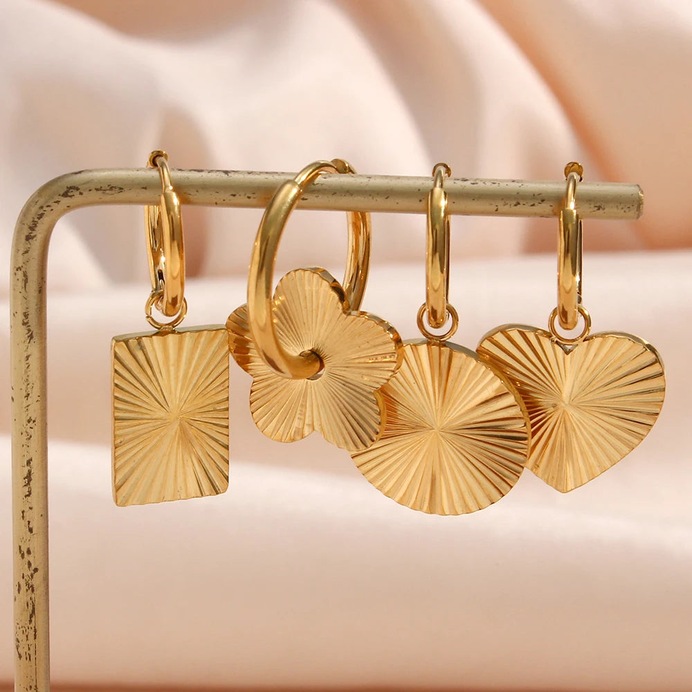 Inner Light Earrings on display rack