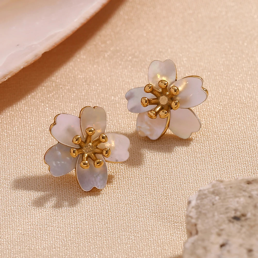 La Primavera Cherry Blossom Earrings on fabric