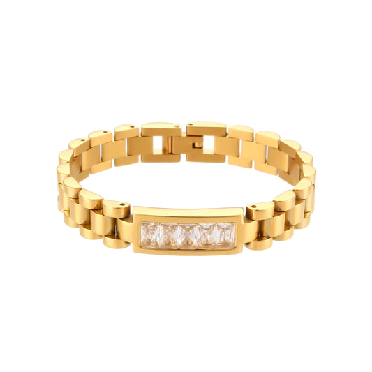 Gold bracelet with diamond accents on a white background