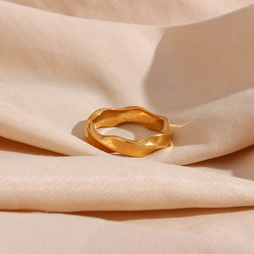 luxe twist ring on display fabric