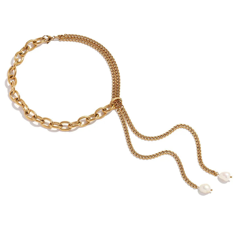 A gold-plated choker necklace with natural pearls and a chain that extends into a lariat style.