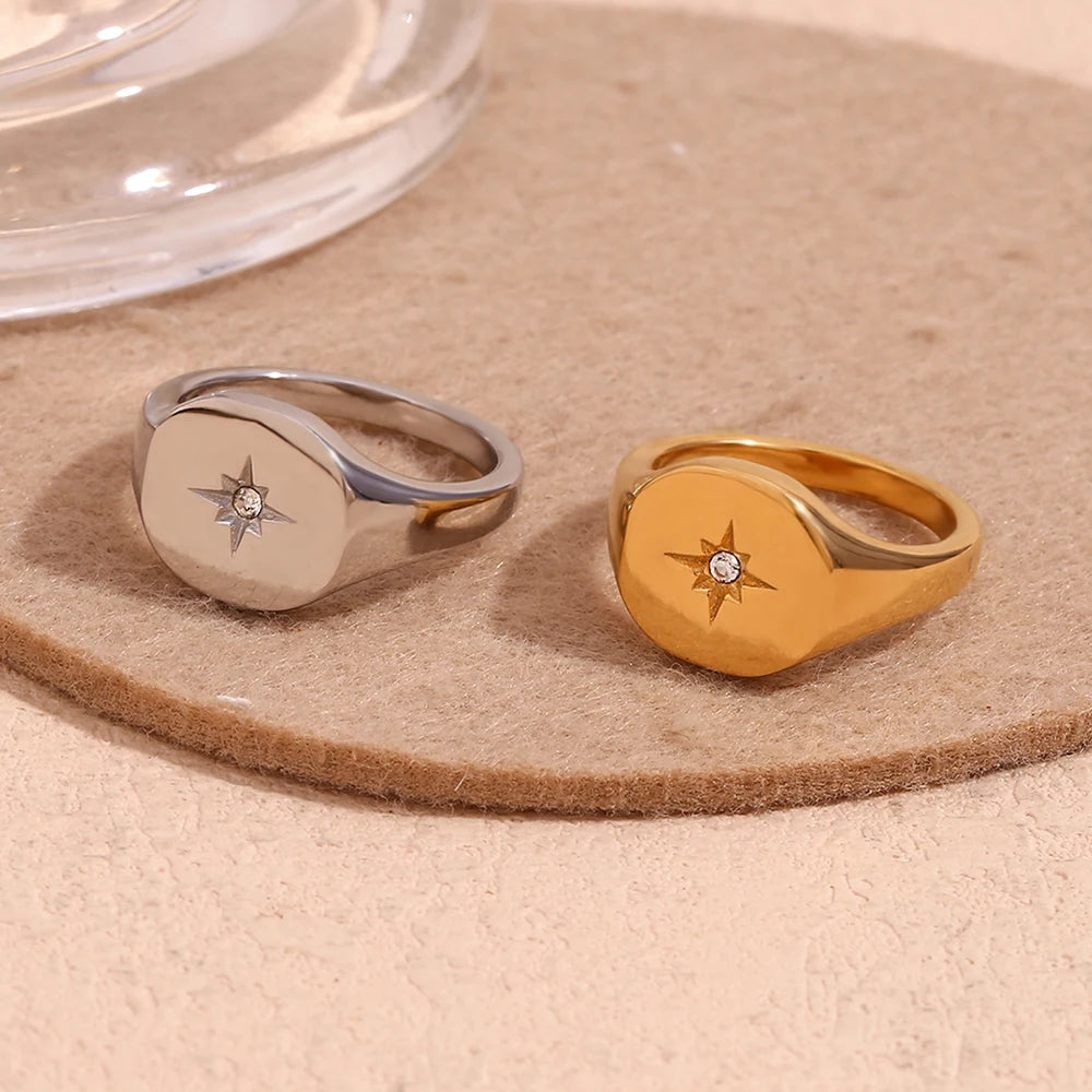 North Star Signet Rings gold and silver on display