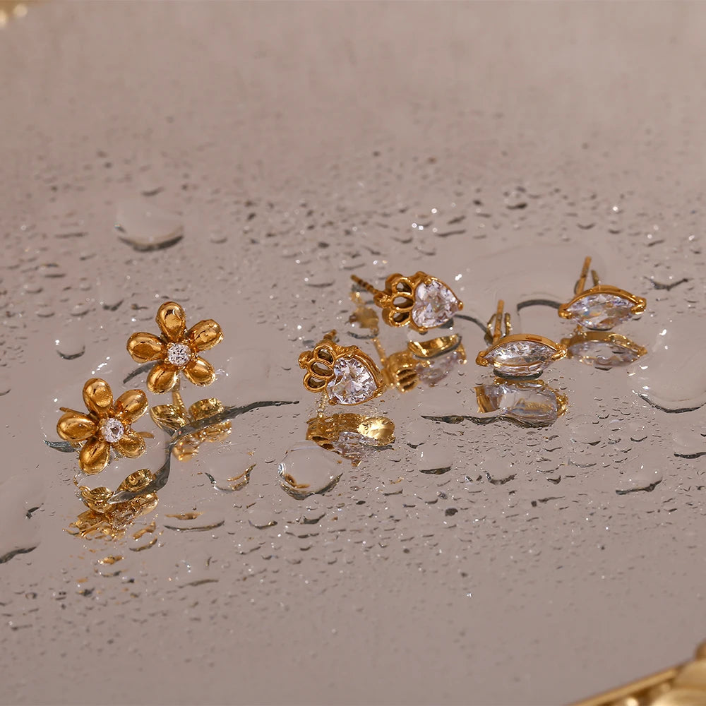 Petite Fleur Stud Earrings wet from water