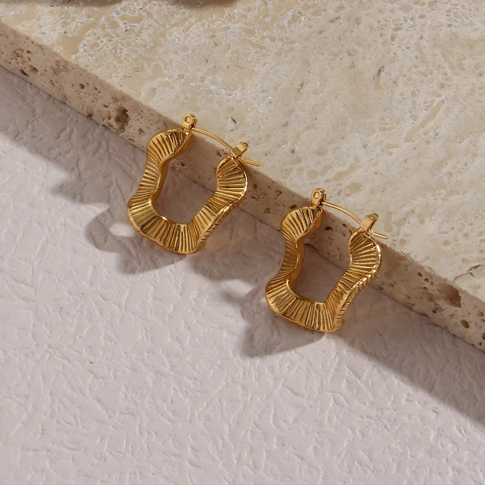 Ripple Effect Hoops against stone tile