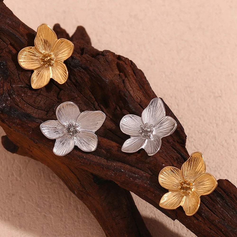 Sakura Grace Stud Earrings on wooden display