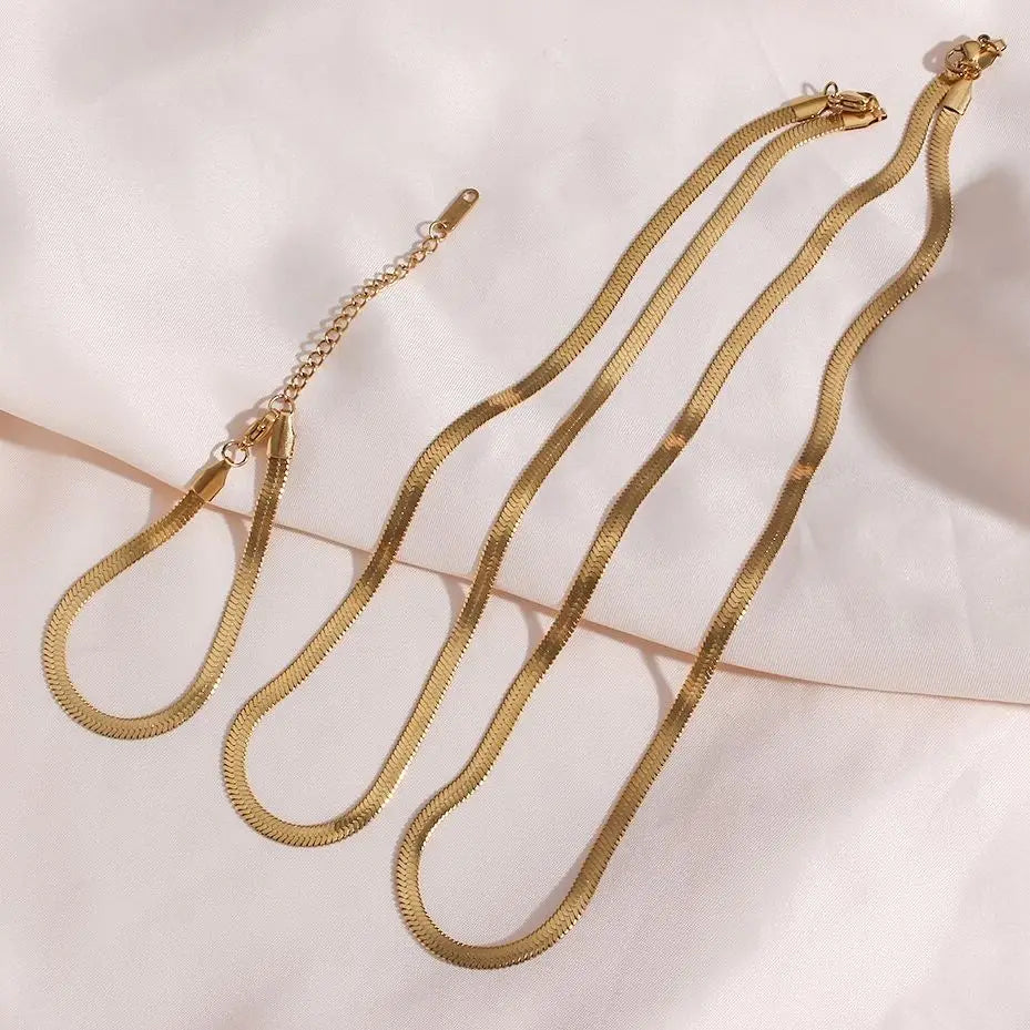 Sleek Line Snake Chain Bracelet gold flat lay