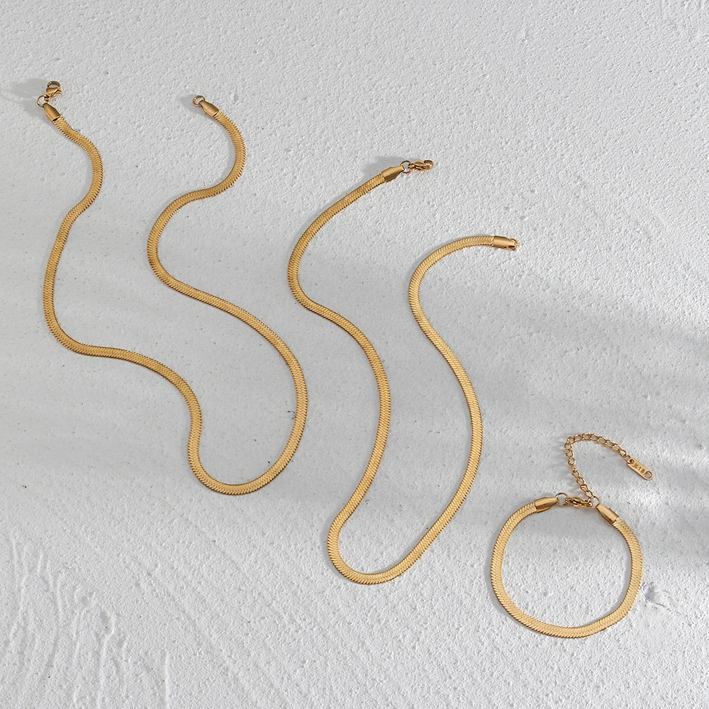 Sleek Line Snake Chain Bracelet gold flat lay