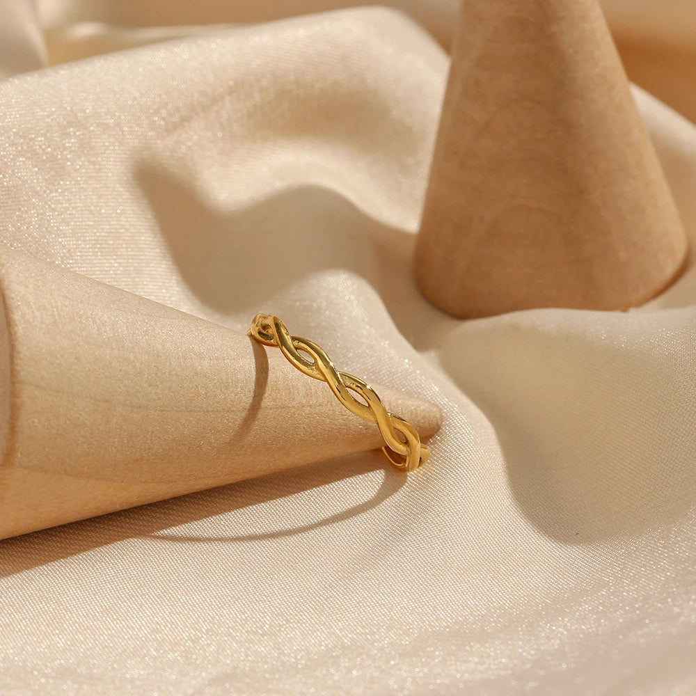 Soft Entwine Ring on fabric displayed