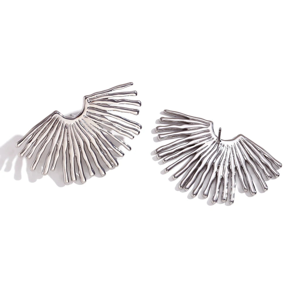 Solar ray Earrings in silver on white background 