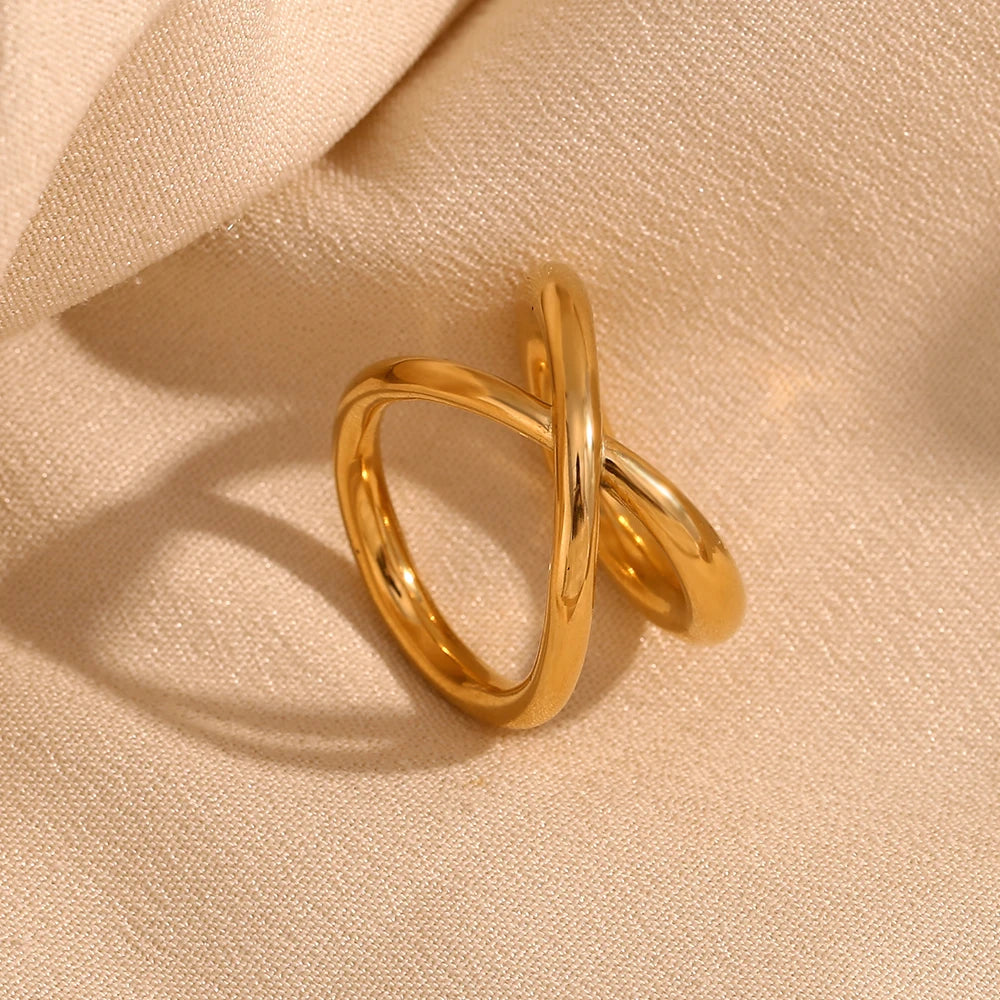 Elegant gold double looped rings with a smooth finish.