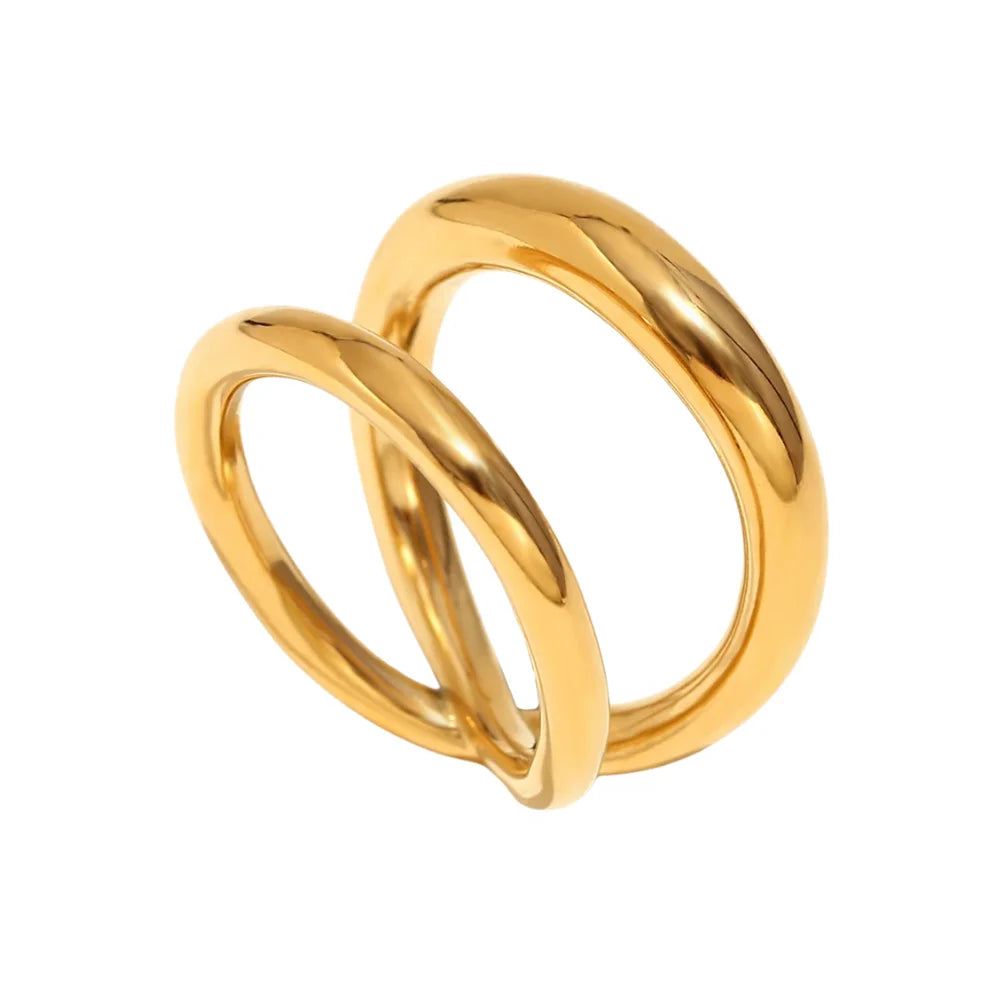 An elegant gold double looped ring with a smooth finish, displayed on a white background.