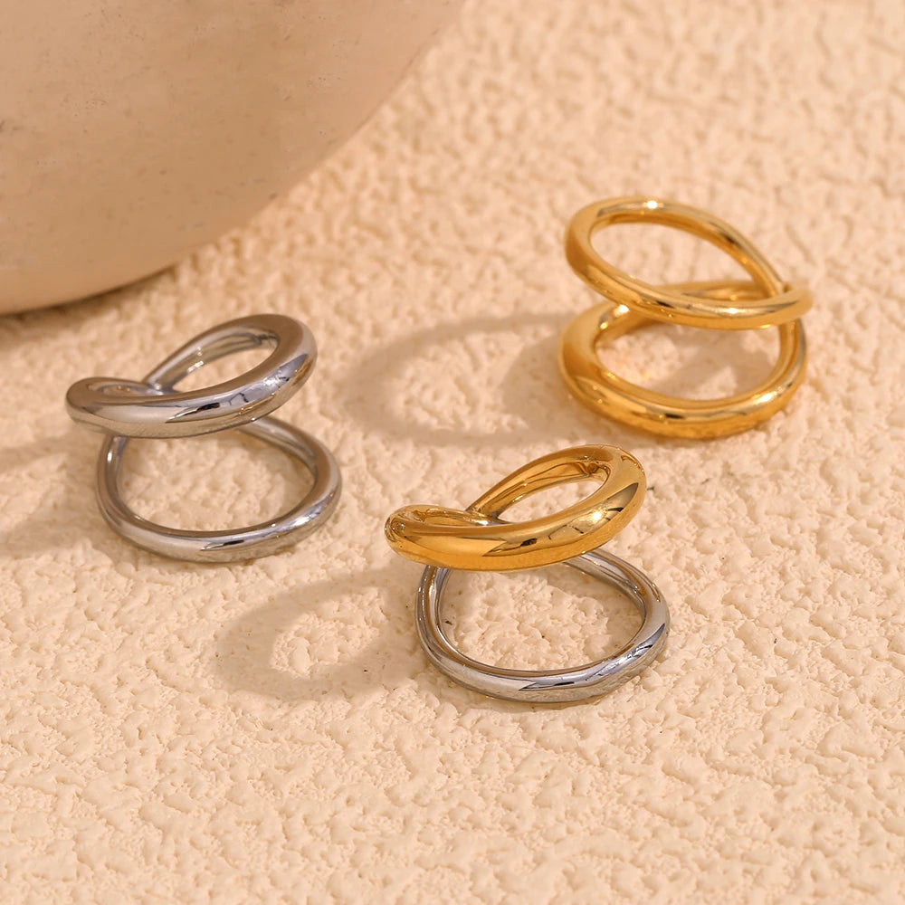 Elegant gold or silver, double looped rings with a smooth finish.