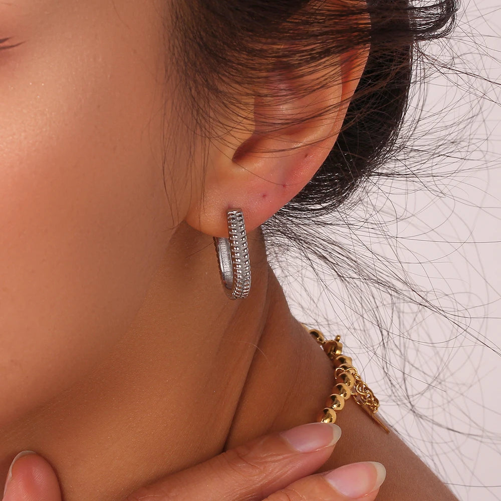 Terra Hoops Earrings silver on model