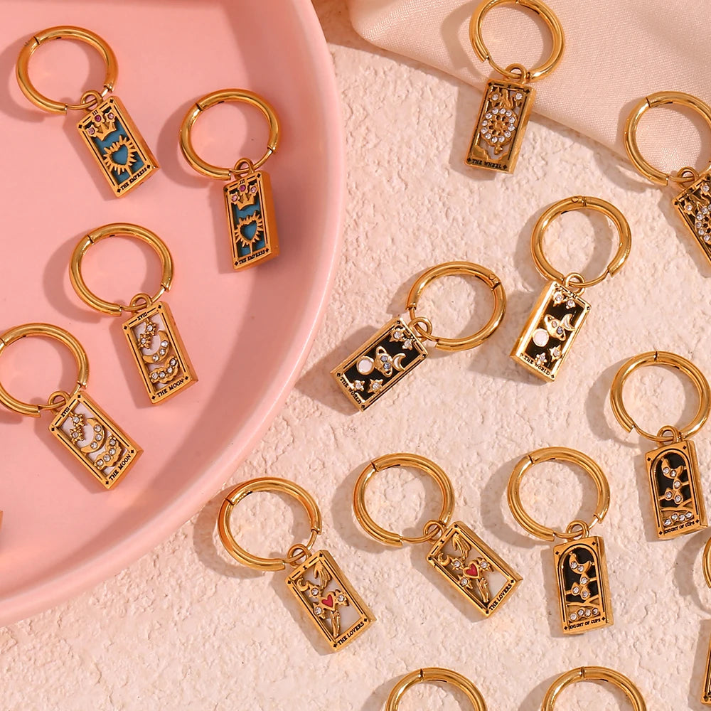 The Magician Tarot Card Earrings flat lay