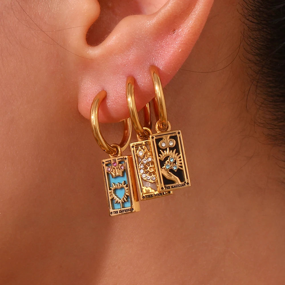 The Magician Tarot Card Earrings on model