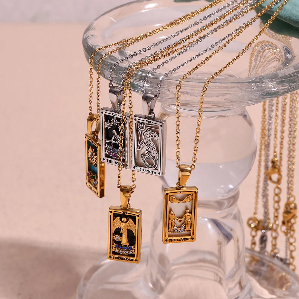 The Magician Tarot Necklaces on glass display