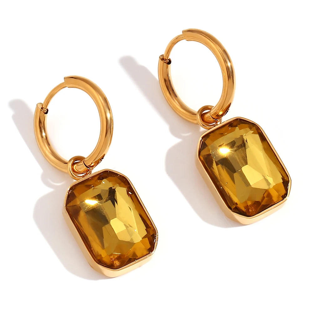 The Precious Earrings Champagne on white background