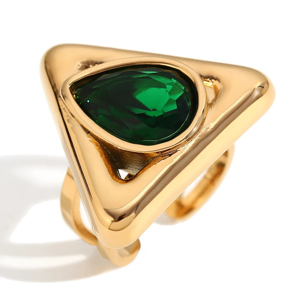 An gold stainless steel ring with a triangular design and a large, green zirconia centerpiece.