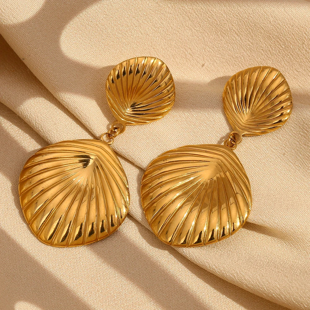 Tidal Grace Earrings on fabric