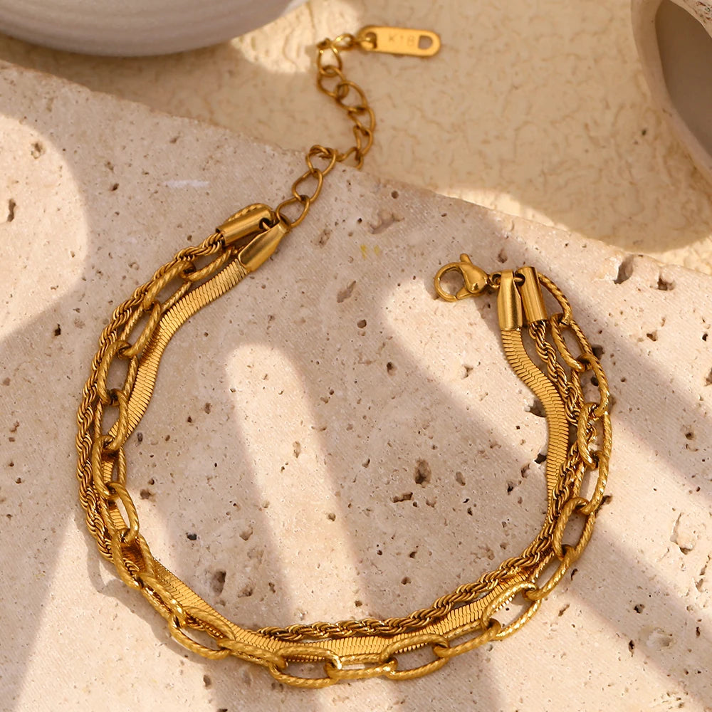 A waterproof bracelet made of three unique gold chains 