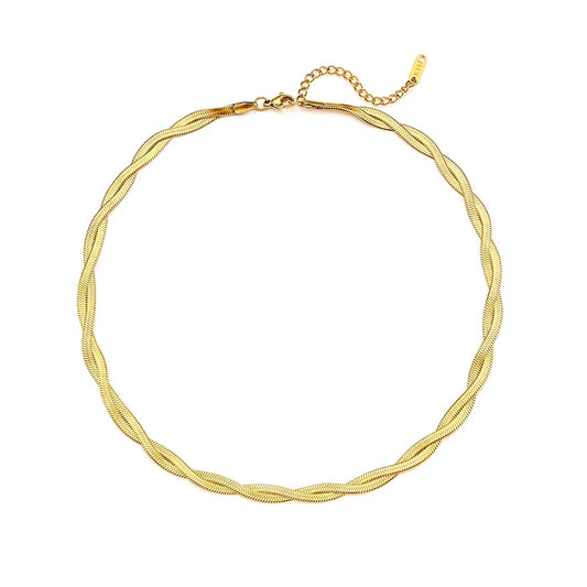 A gold twisted snake chain Necklace made from 18K gold plated stainless steel, flat layed on a white background.