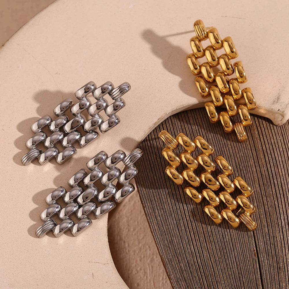 Unity Earrings flat lay